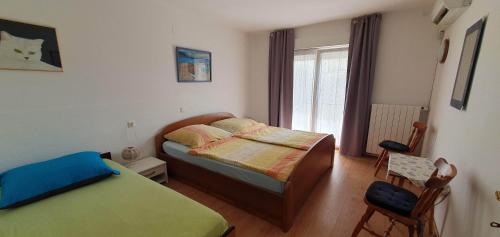 Apartments with parking space Rab - 14792