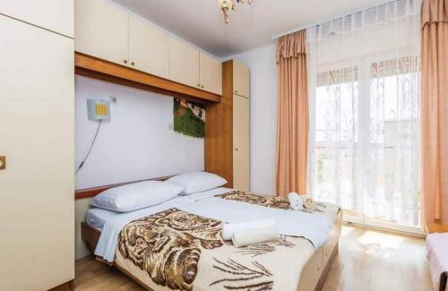 Apartments with parking space Barbat, Rab - 22498