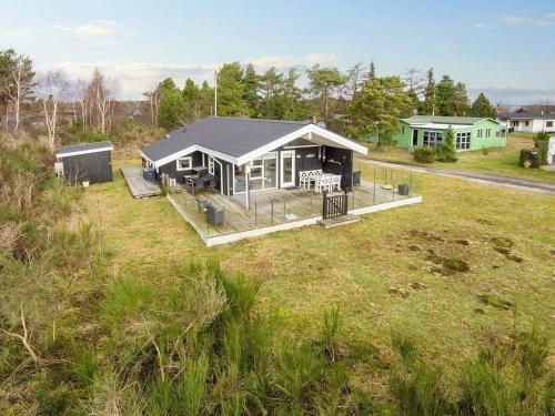 an overhead view of a house in a field at 4 star holiday home in Juelsminde-By Traum in Sønderby