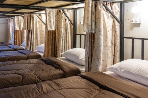Postel nebo postele na pokoji v ubytování Hug pai hostel