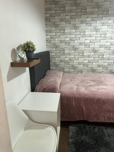 Кровать или кровати в номере Casa Vázquez , "Como en casa" , hospédate con nosotros y recibirás una atención personalizada, servicio y confort nos distingue.