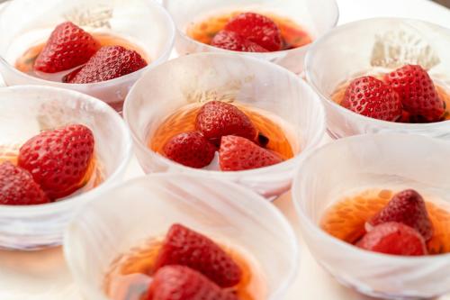 a group of plastic cups with strawberries in them at Hachimantai Mountain Hotel & Spa in Hachimantai