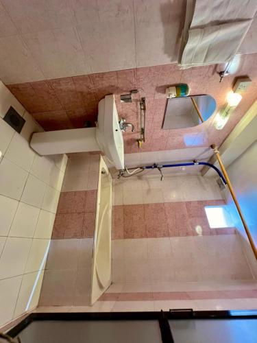 een eigen badkamer met een toilet bij Taleju Grand Hotel in Bhaktapur