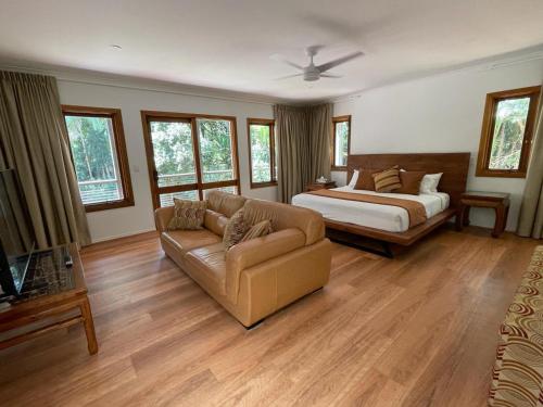 Pethers Rainforest Retreatにあるベッド