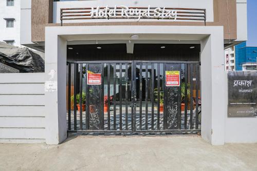 an entrance to a building with a gate at FabHotel Royal Stay - Beltarodi in Nagpur