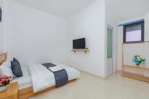 TV a/nebo společenská místnost v ubytování Palm 14 DaLat - In Nam Ho Resort