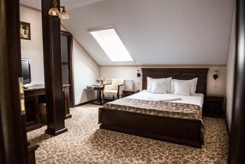 En eller flere senge i et værelse på Hotel President