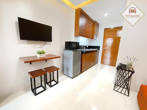 Kuchyň nebo kuchyňský kout v ubytování GTC Apartelle
