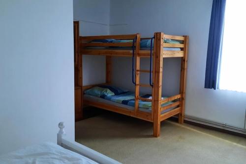 Postel nebo postele na pokoji v ubytování Gemütliche Ferienwohnung am Wildgehege