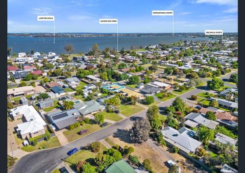 an aerial view of a suburb with houses at The Sturt Stay in Mulwala
