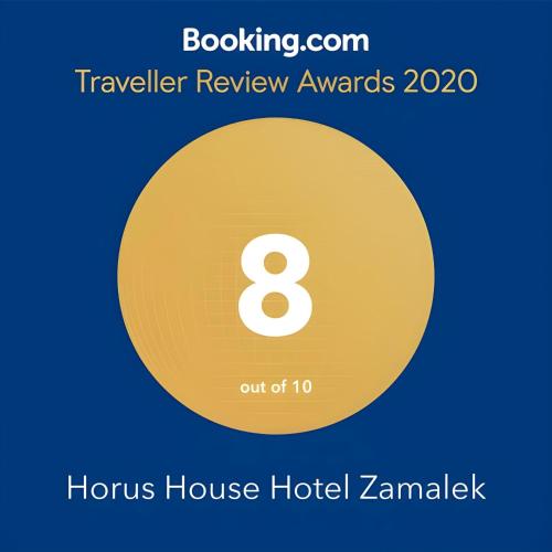Certificado, premio, señal o documento que está expuesto en Horus House Hotel Zamalek