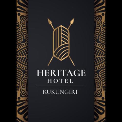 Heritage Hotel Rukungiri في Rukungiri: علامة لفندق تراثي مع rijeff