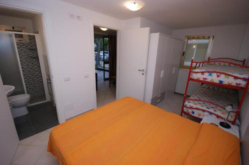 Ένα ή περισσότερα κρεβάτια σε δωμάτιο στο 67 Bellaria Bilocale vicino al mare