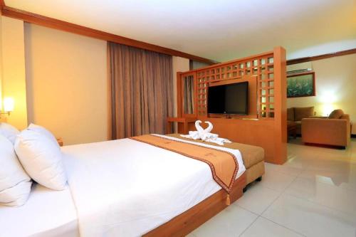 Tempat tidur dalam kamar di Patra Comfort Jakarta