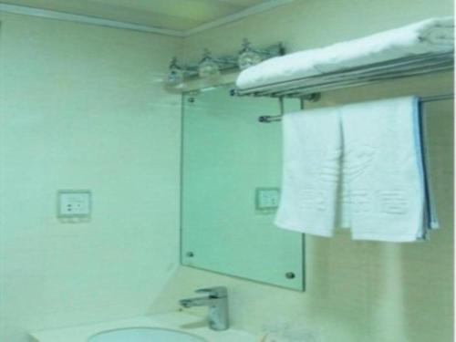 Vonios kambarys apgyvendinimo įstaigoje Kunlun Leju Business Hotel Kaifeng Gulou