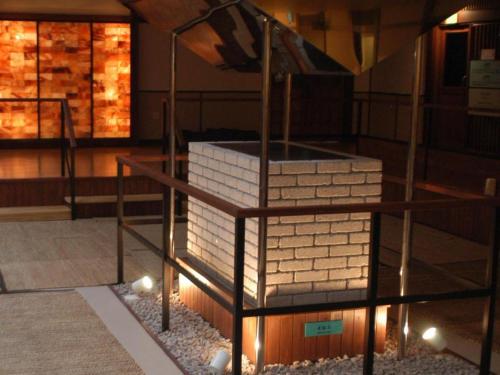 a stack of bricks on a shelf in a building at Hakata Yufuin Takeo Onsen Manyo no Yu in Fukuoka