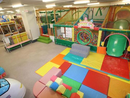 a play room with a lego table and a game at Hakata Yufuin Takeo Onsen Manyo no Yu in Fukuoka