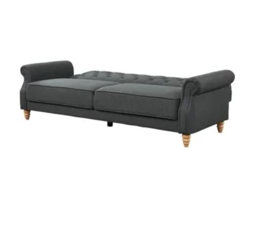 a black couch is shown on a white background at T3 cosy proche Paris, tous commerces et Rer à pied in Viry-Châtillon