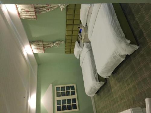 Tempat tidur dalam kamar di TO915101 STILL LOVE THEME HOTEL