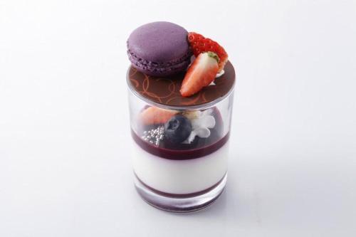 a glass jar filled with different types of desserts at Hotel Grand Shinonome in Tsukuba