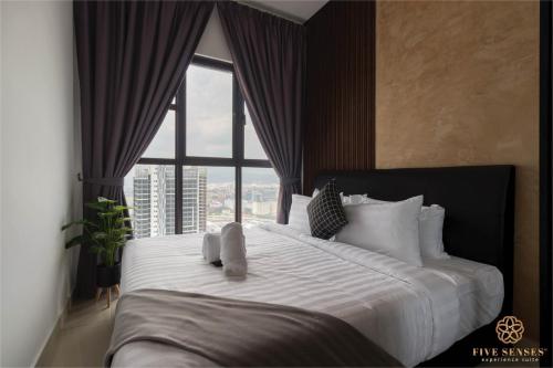 En eller flere senge i et værelse på Trion Kuala Lumpur by Five Senses