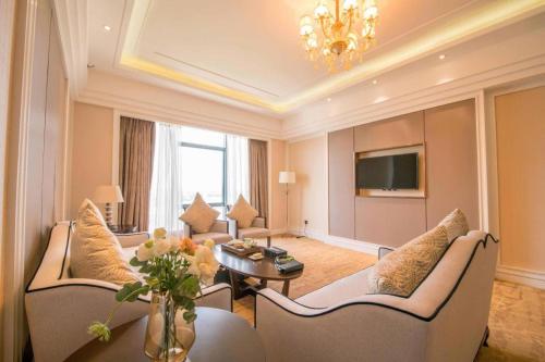 TV a/nebo společenská místnost v ubytování Enping Yucca Hotel