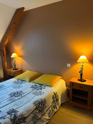 Postel nebo postele na pokoji v ubytování Le Moulin de la Butte
