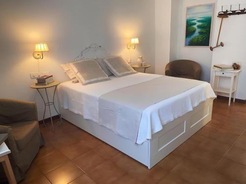 מיטה או מיטות בחדר ב-A Casa di Gemma - Affitti Brevi Italia