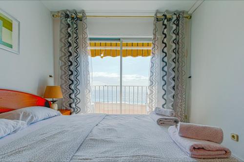 Postel nebo postele na pokoji v ubytování Apartment Arena - Lloret de Mar