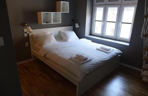 Кровать или кровати в номере MAGIC GARDEN 2 ZAGREB CENTER