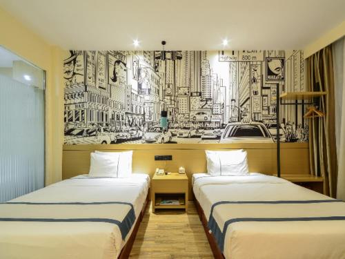Ένα ή περισσότερα κρεβάτια σε δωμάτιο στο City Comfort Inn Wuhan Wuhan Ring Sports Center Airport