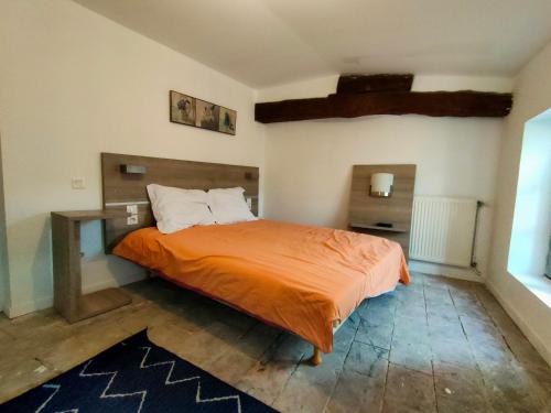 Posteľ alebo postele v izbe v ubytovaní L'escale de Compostelle