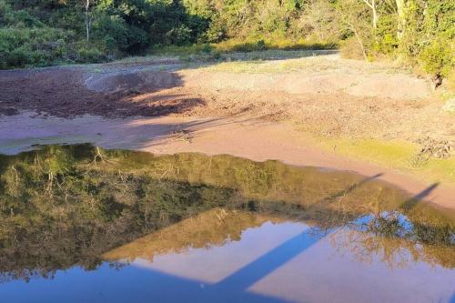 an aerial view of a body of water at Aristaa Morni Hills: Pristine Stay in the Wild in Morni
