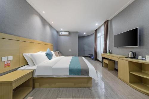 Voodi või voodid majutusasutuse Ying Feng Yuan Hotel toas
