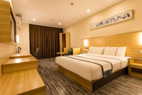 Krevet ili kreveti u jedinici u objektu City Comfort Inn Chongzuo Youyi Avenue