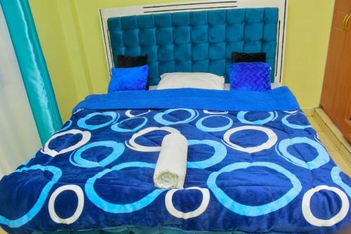 Ένα ή περισσότερα κρεβάτια σε δωμάτιο στο The O,S Homestay