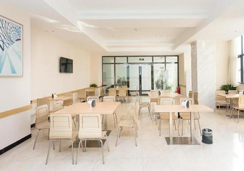 ห้องอาหารหรือที่รับประทานอาหารของ City Comfort Inn Xiangyang Minfa World City Minfa Plaza