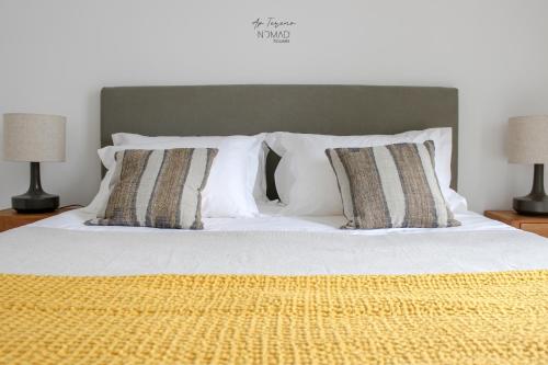 Łóżko lub łóżka w pokoju w obiekcie Nomad Houses - Ap Tereno