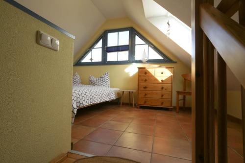 Ένα ή περισσότερα κρεβάτια σε δωμάτιο στο Utkiek W5 - Ihr Hafen der Erholung in Zingst