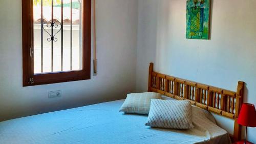 A bed or beds in a room at MEDDAYS VILLA TER