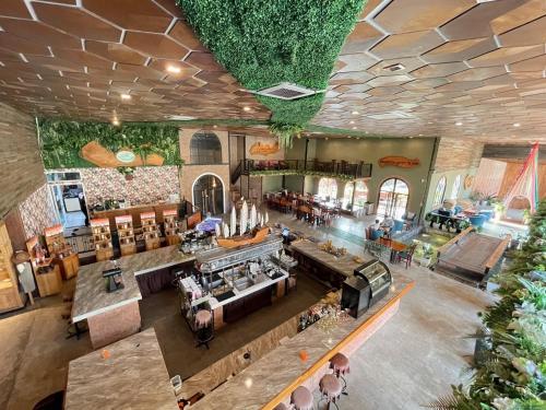 Restaurace v ubytování The Hub Erawan Resort