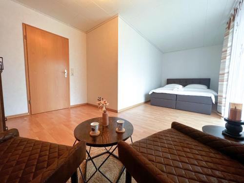 Postel nebo postele na pokoji v ubytování Schönes Zimmer in Vechta mit Küche Self-Check-In