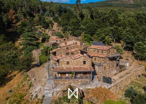 an aerial view of a house on a hill at MyStay - Casa do Talasnal by Refúgio ao Luar in Talasnal