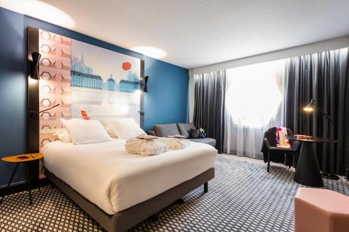 Кровать или кровати в номере Mercure Bordeaux Centre Ville