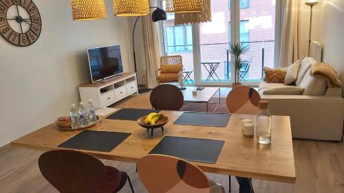 Courbevoie lodgeにあるテレビまたはエンターテインメントセンター