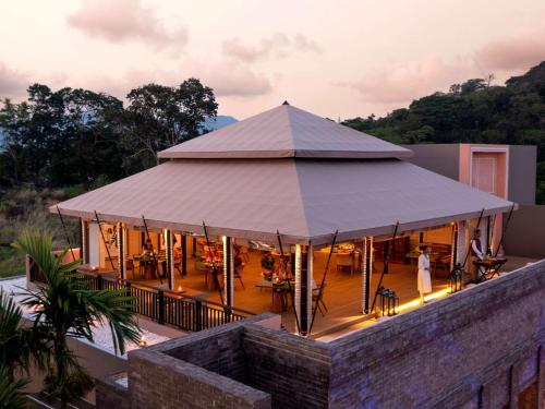 a large tent on top of a building at Avista Hideaway Phuket Patong - MGallery in Patong Beach