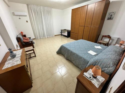Posteľ alebo postele v izbe v ubytovaní Villa con piscina "Pumo"
