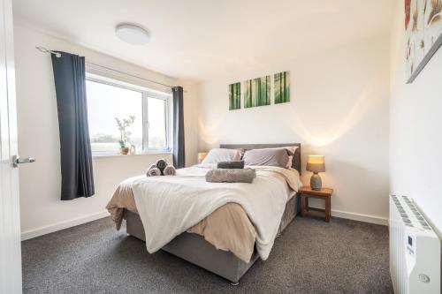 Cama o camas de una habitación en Riversfield Stay