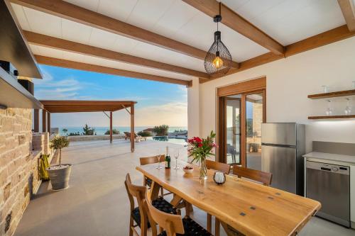 Η κουζίνα ή μικρή κουζίνα στο Delfini Villas 1, 2, 3, 4, 5, 6 - Kalamaki