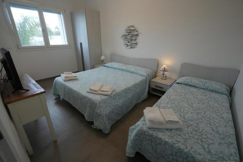 Ένα ή περισσότερα κρεβάτια σε δωμάτιο στο Villa Anastasia Apartment